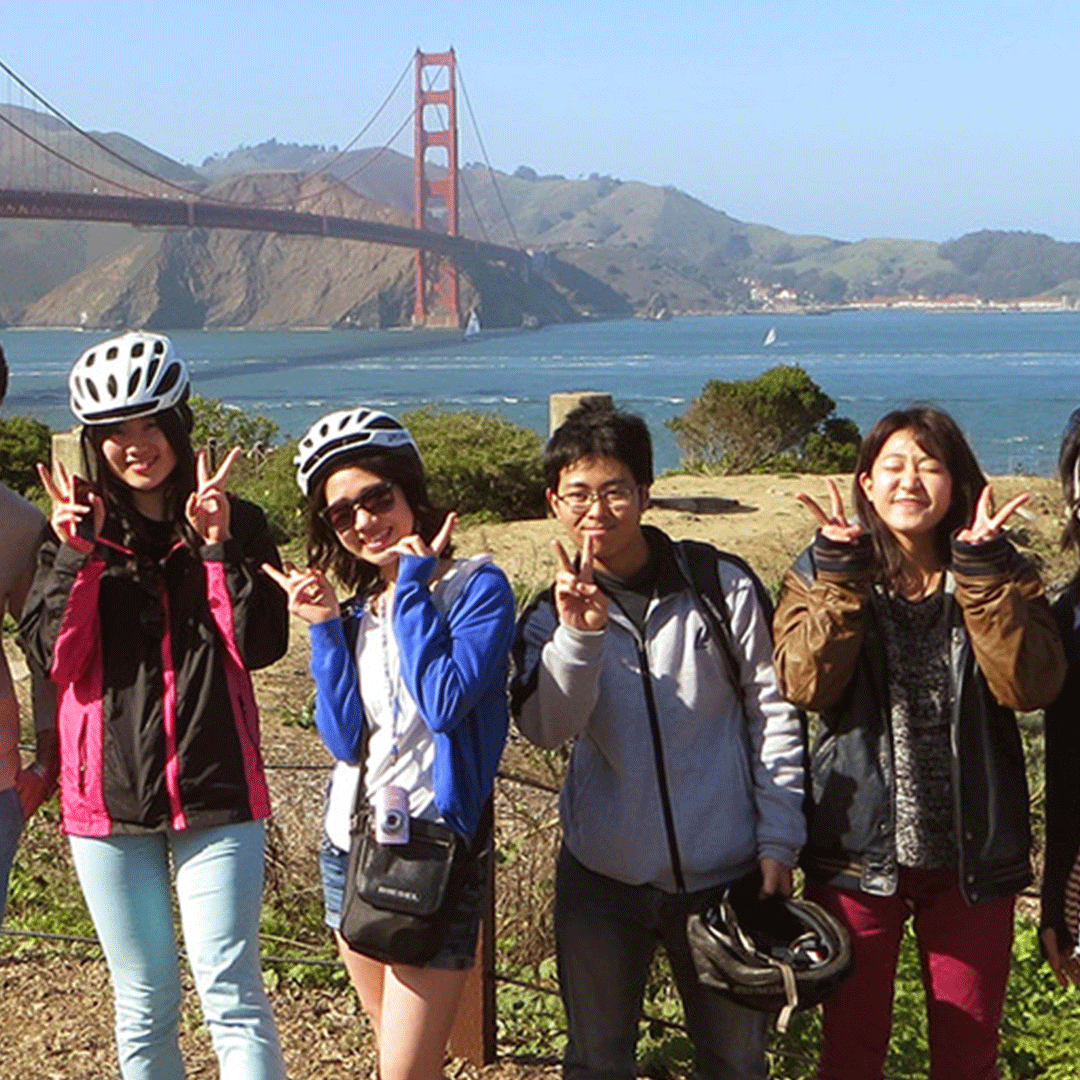 International students after bicycling over the Golden Gate Bridge