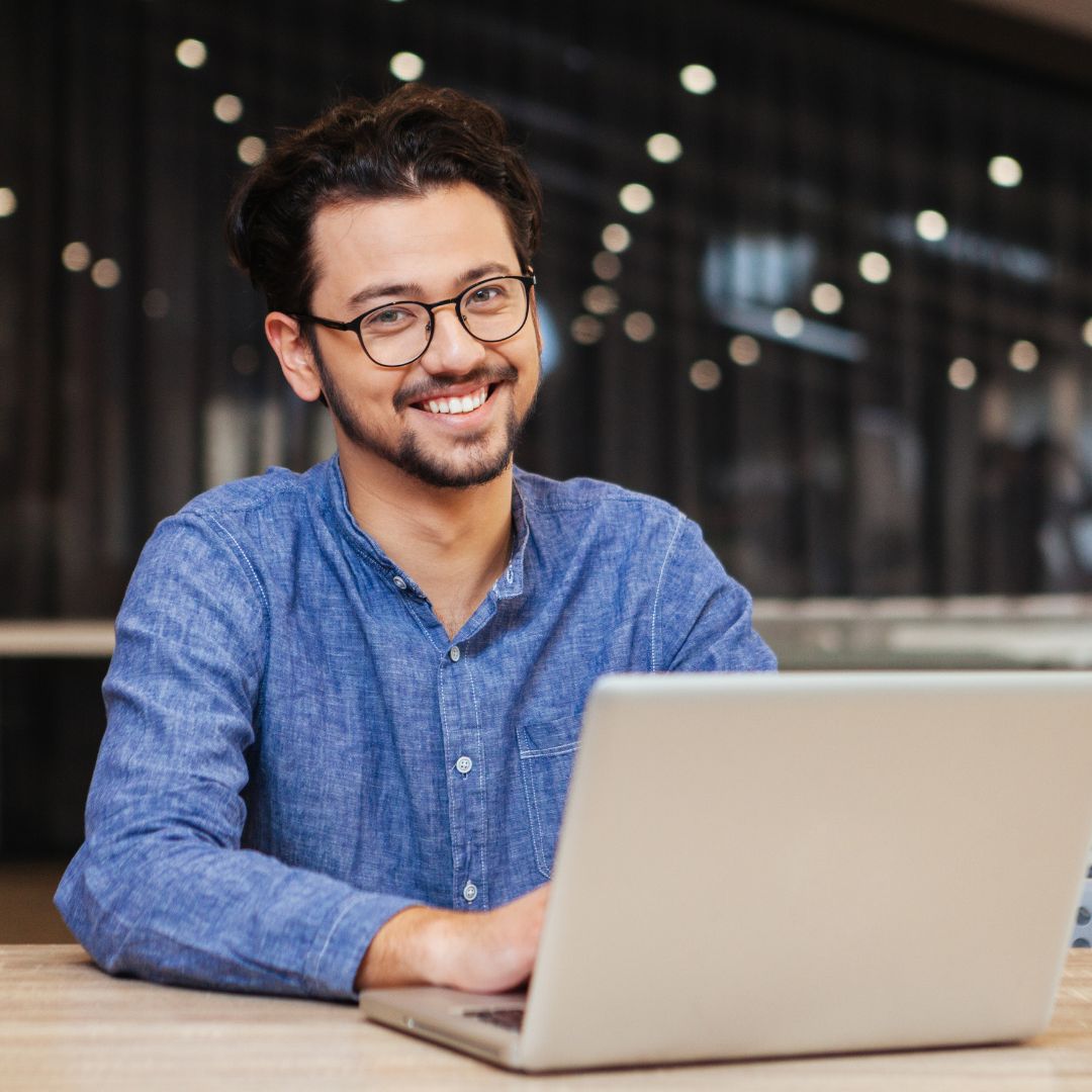 Smiling student taking an online course