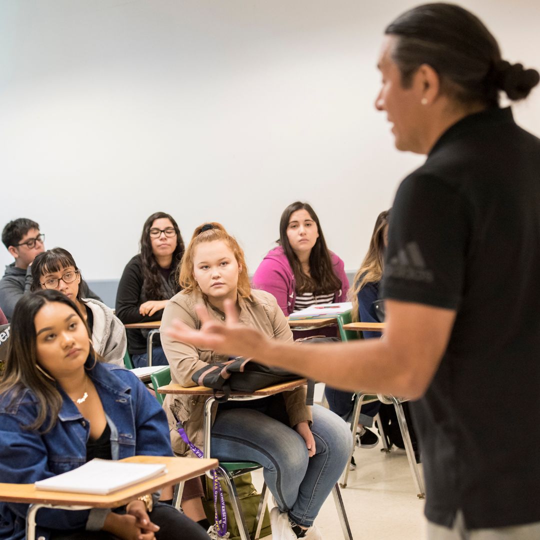 Ethnic Studies professor lecturing in classroom