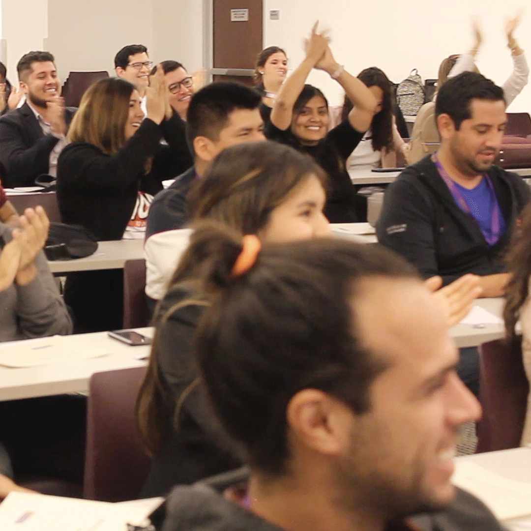 International students applaud in class