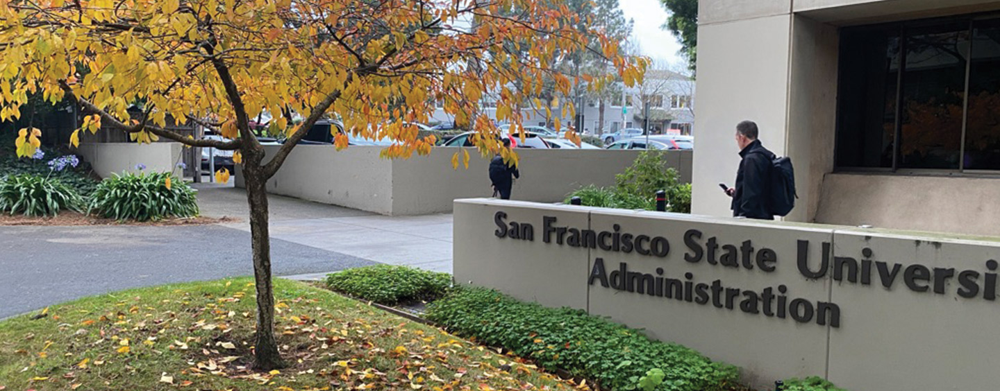 Golden fall leaves on a tree outside the Administration building