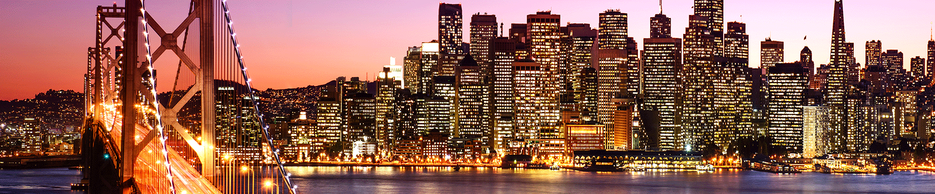 San Francisco skyline and Bay Bridge with purple sky