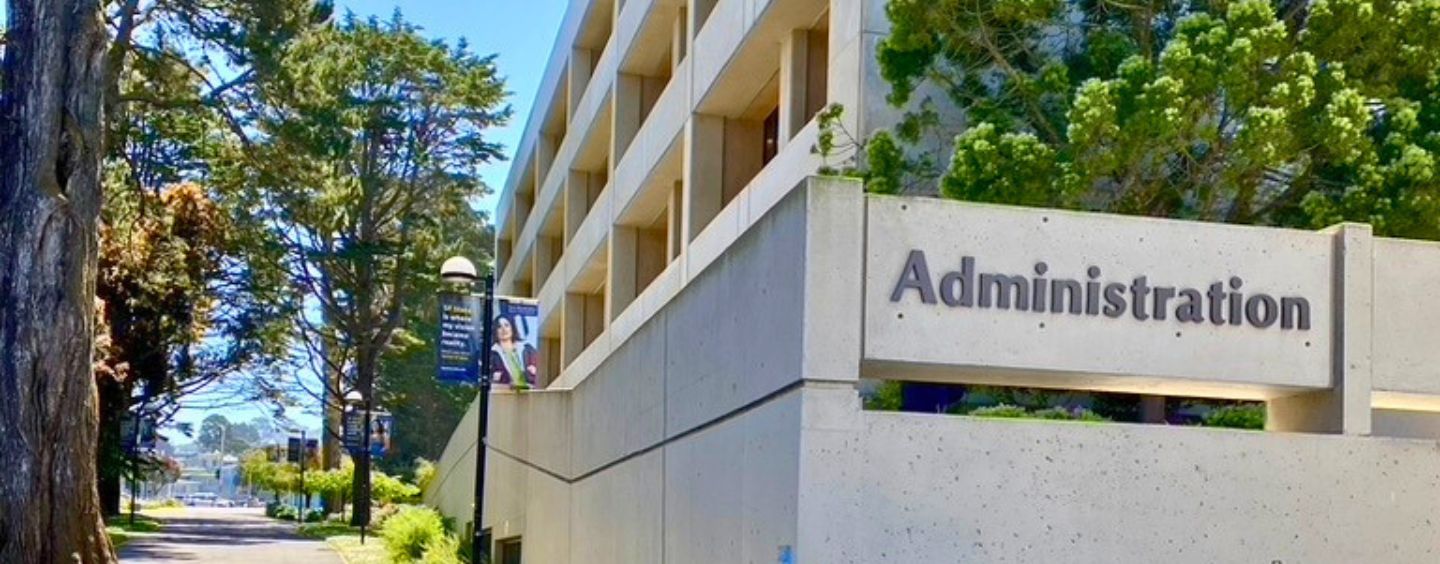 Administration building and path out of campus