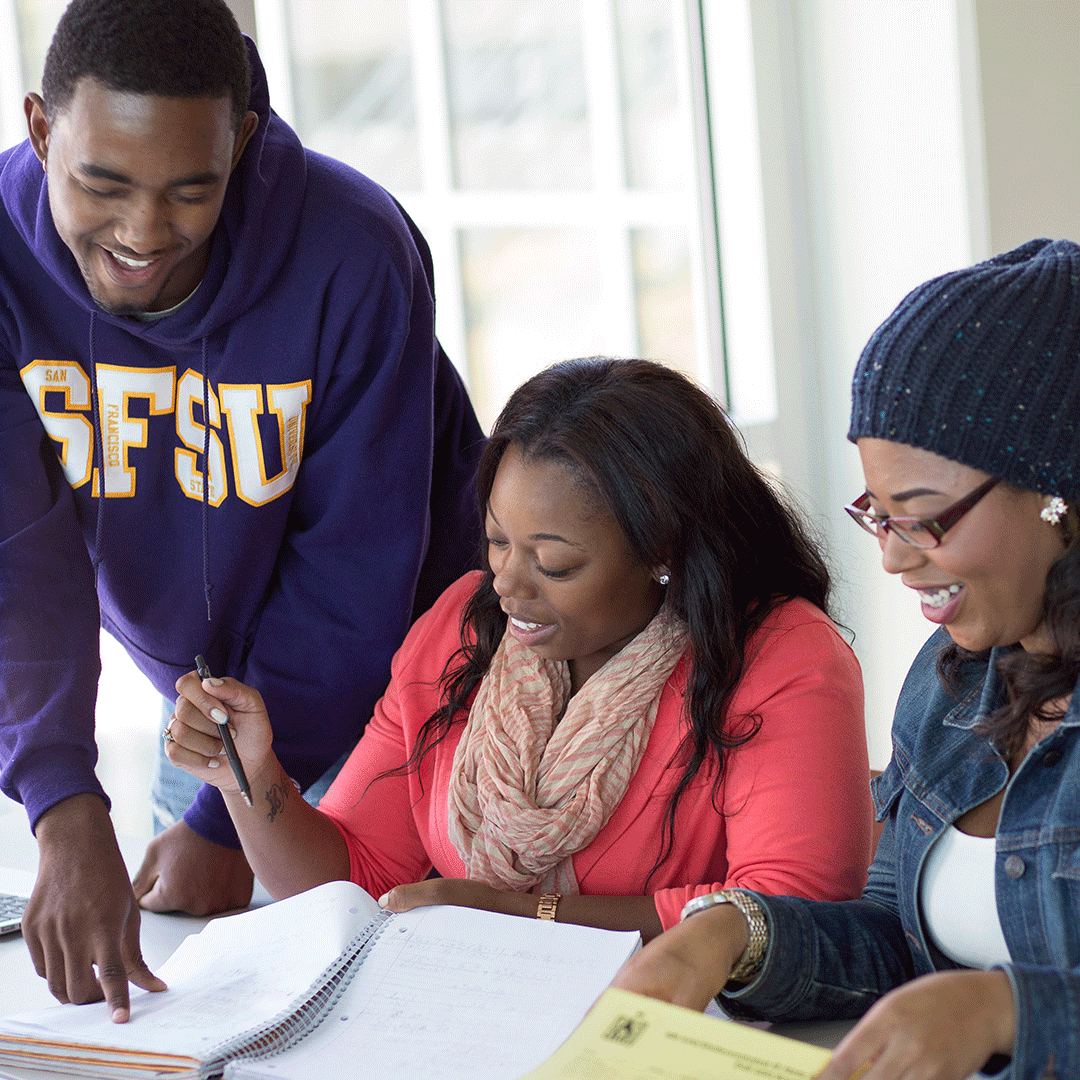 Trio of SF State students study together in the library