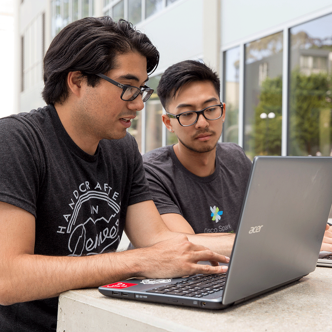 Two students study online at SF State