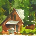 Watercolor painting of a cabin in the trees