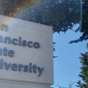 SF State sign with a rainbow lens flare