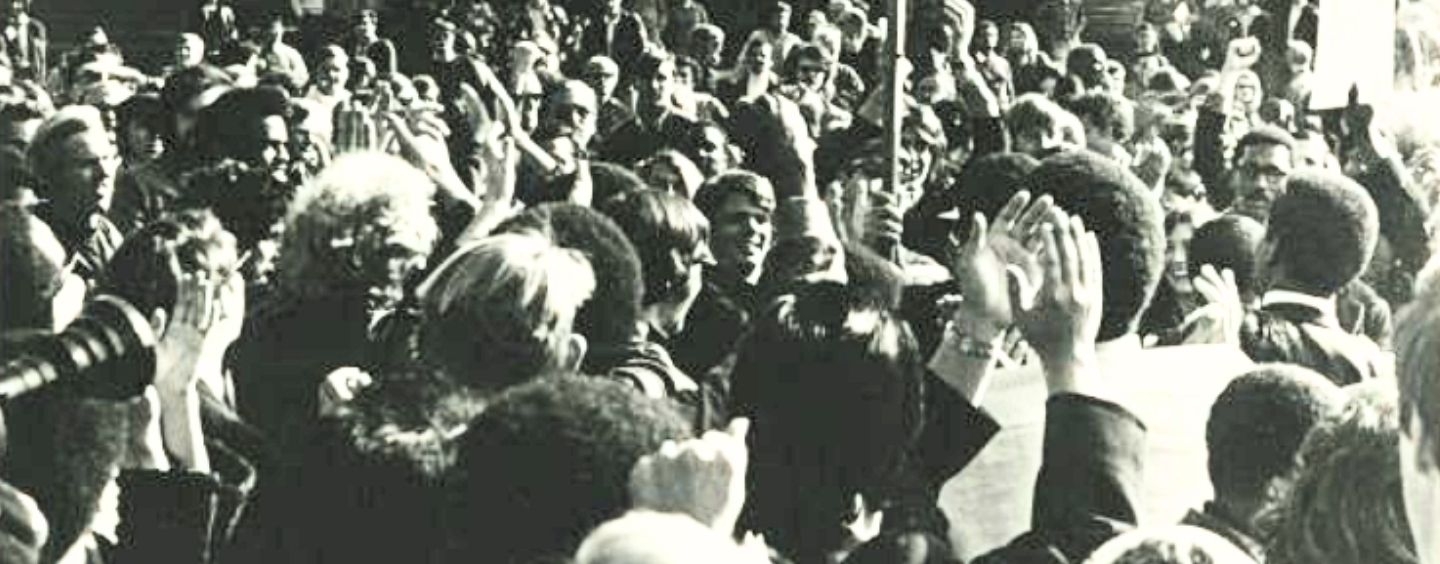 Crowd on campus lawn, one holding sign that reads, "AFL - CIO. responsible conservative labor supports black students + 3rd world," San Francisco State College strike, 1968 - 1969