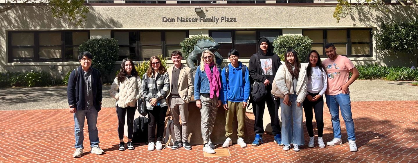 International students in the Don Nasser Family Plaza on campus