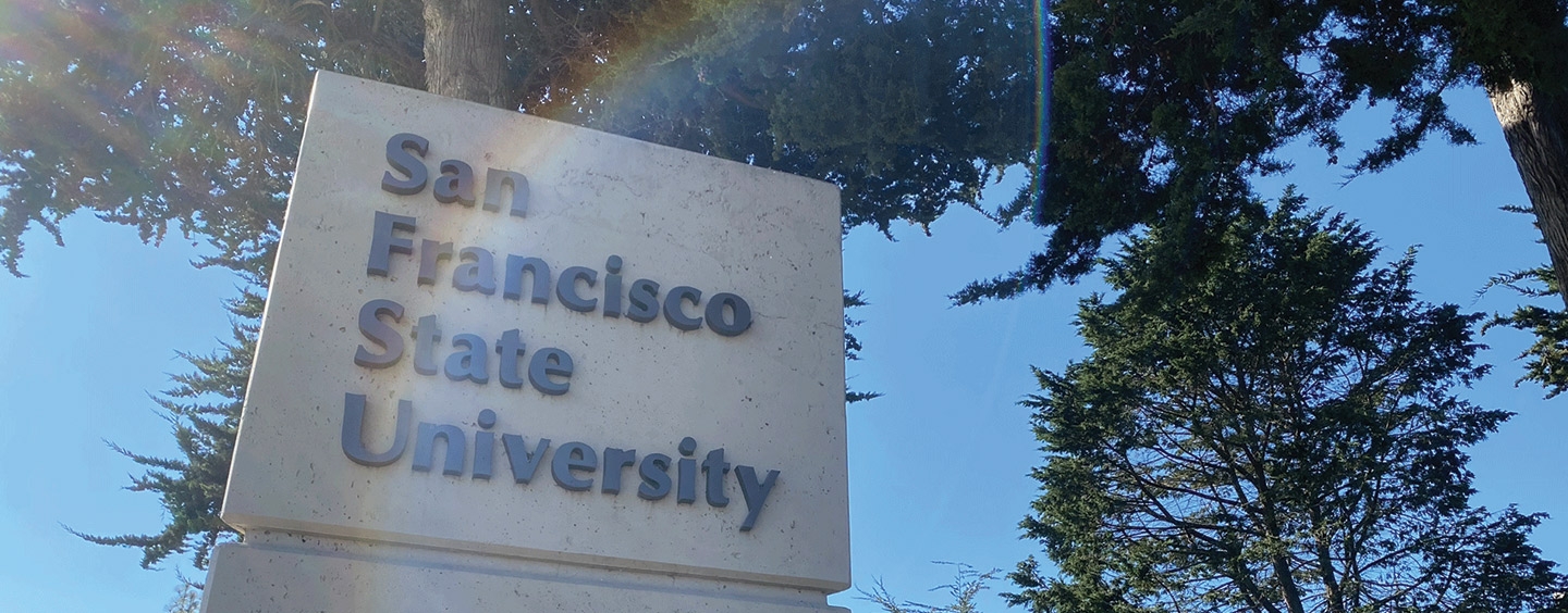 SF State sign with a rainbow lens flare
