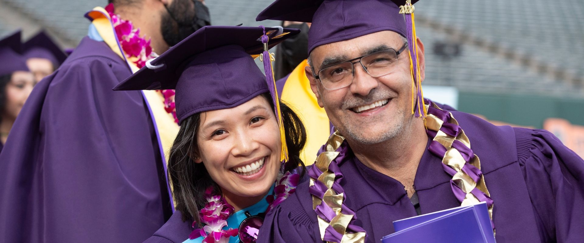 Pair of SF State graduates at Commencement