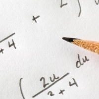 Calculus equations on paper with pencil