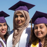 Psychology graduates on the beach