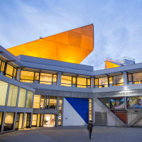 SF State's student union, lit up in the evening