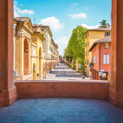 A view of orange and yellow buildings in Italy