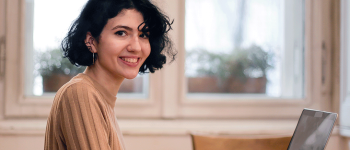 Innovation and Critical Thinking student studying at home on her laptop