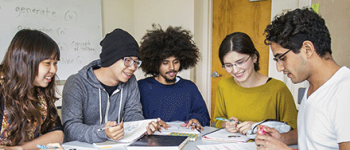 International students learning English in class at the American Language Institute
